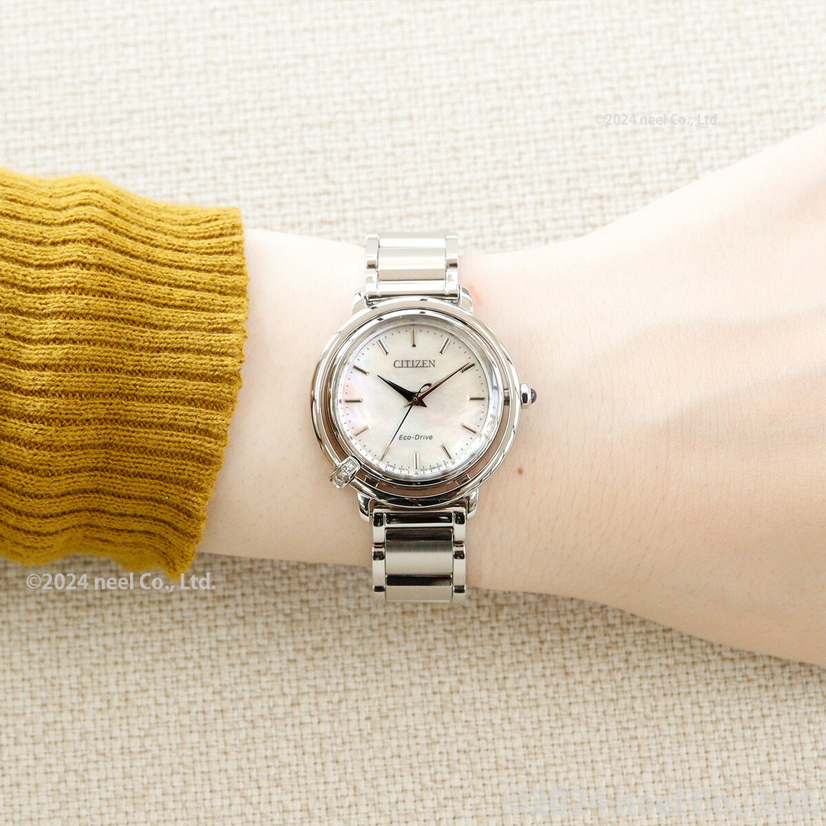 シチズン エル CITIZEN L エコドライブ 腕時計 レディース EM1090-60D ダイヤ入り 白蝶貝文字板 ARCLY Collection 日の出 モチーフ 替えバンド付き