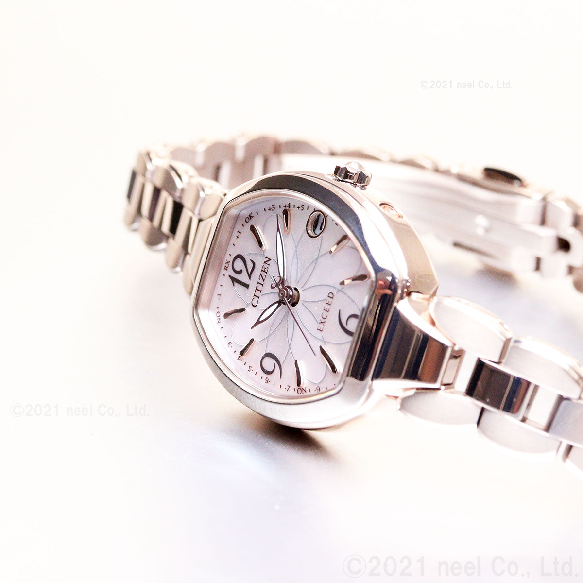 シチズン エクシード CITIZEN EXCEED エコドライブ 電波時計 ティタニア ハッピーフライト 腕時計 レディース ES9482-51W フラワーバンド トノー型