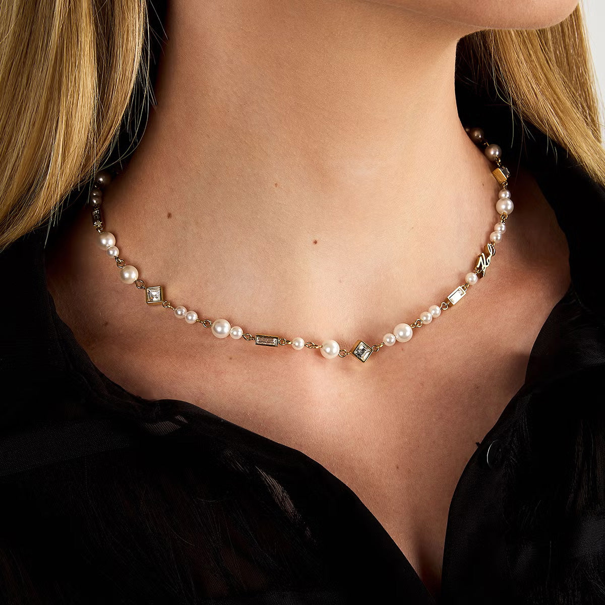 カール ラガーフェルド KARL LAGERFELD ネックレス ペンダント アクセサリー パールコレクション Pearl Collection イエローゴールド シェル パール ホワイト クリスタル バゲット カット ストーン KLAYR17